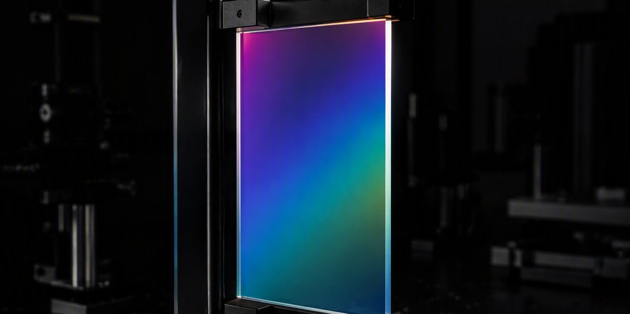 Glass panel showing rainbow interference colors from a thin sol-gel coating.