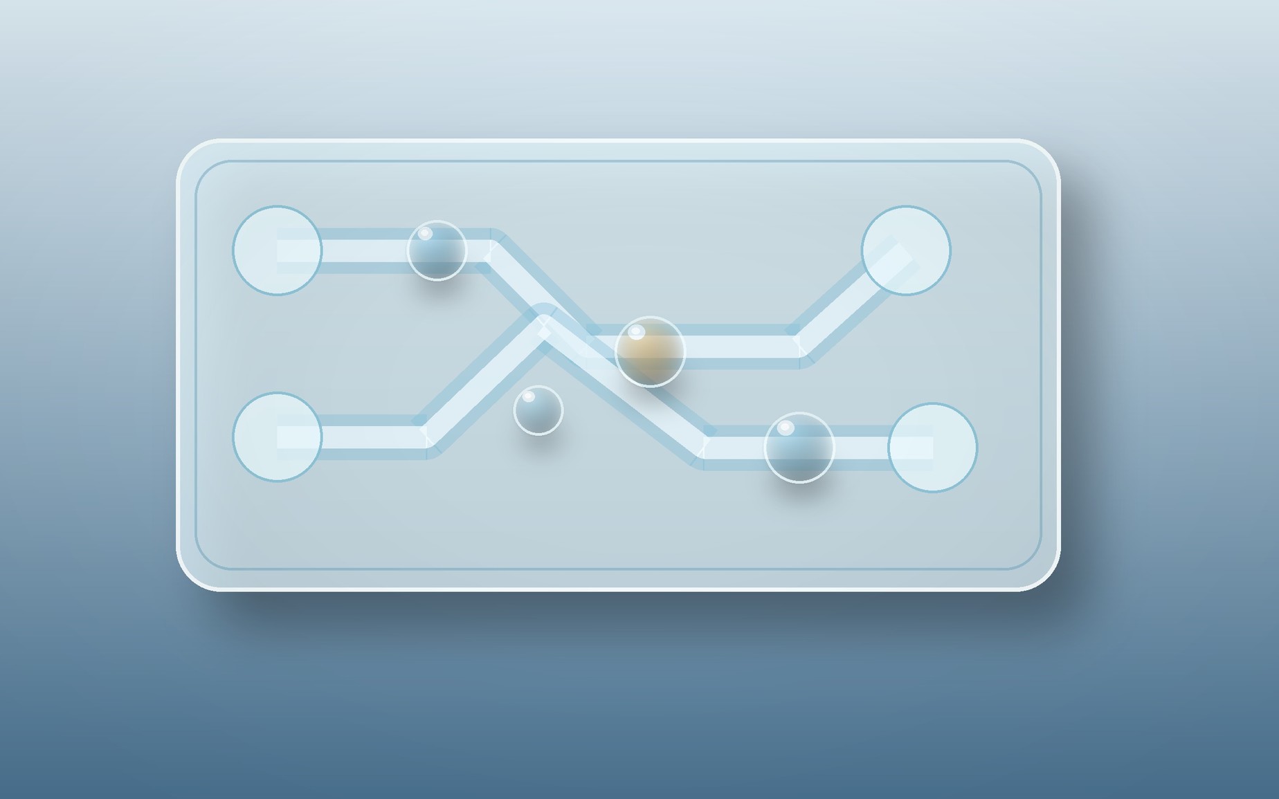 A clear microfluidic chip contains separated droplets traveling through smooth curved channels.