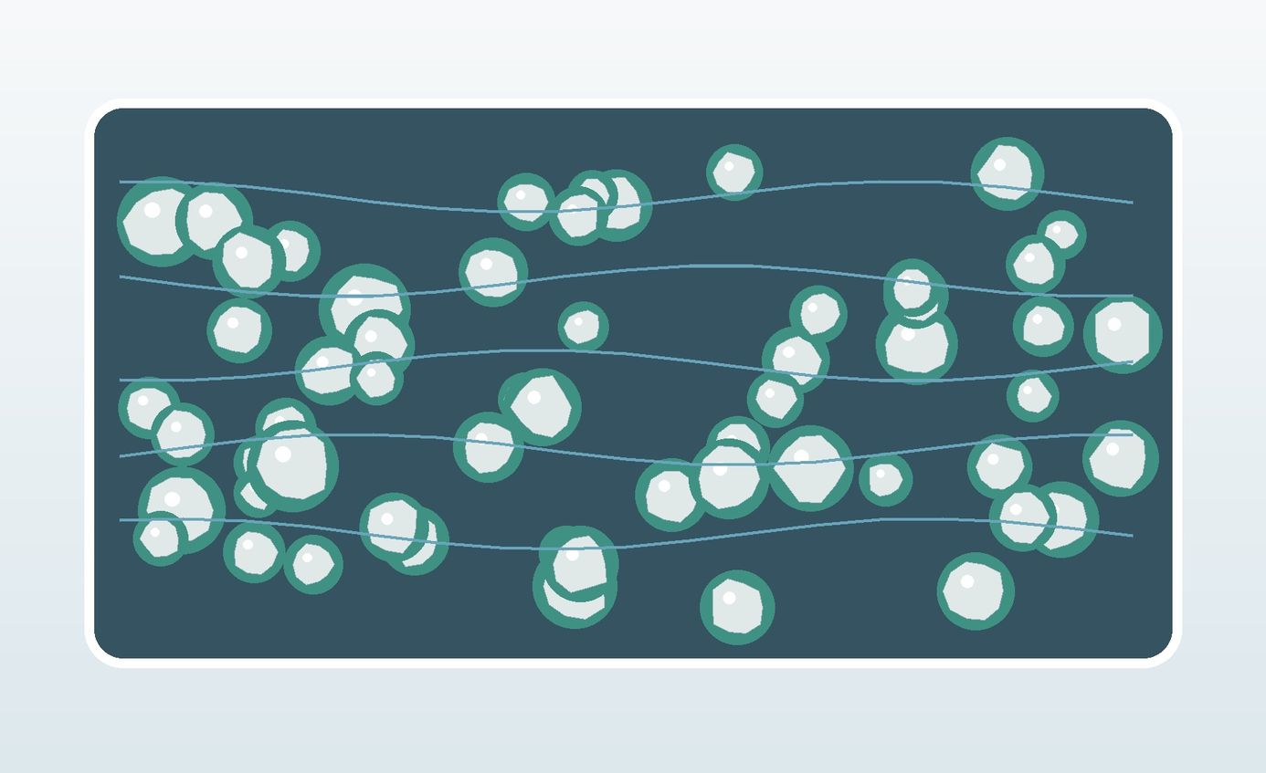 Light mineral filler particles with subtle surface shells distributed evenly in a continuous polymer matrix.