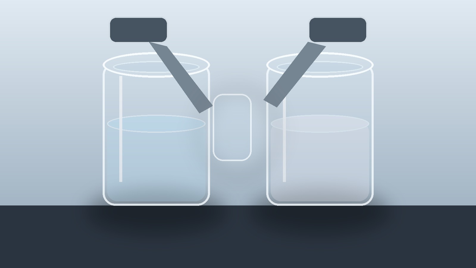 Two clear reactive silicone liquids in separate laboratory vessels before two-part blending.