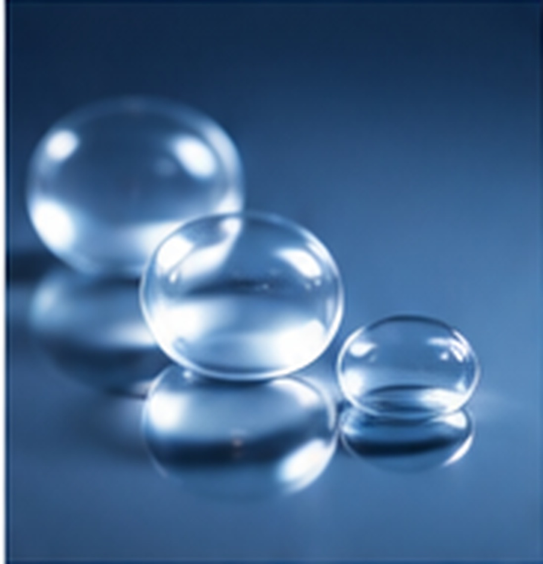 Glossy viscous silicone resin forming concentric flow rings to illustrate controlled rheology.