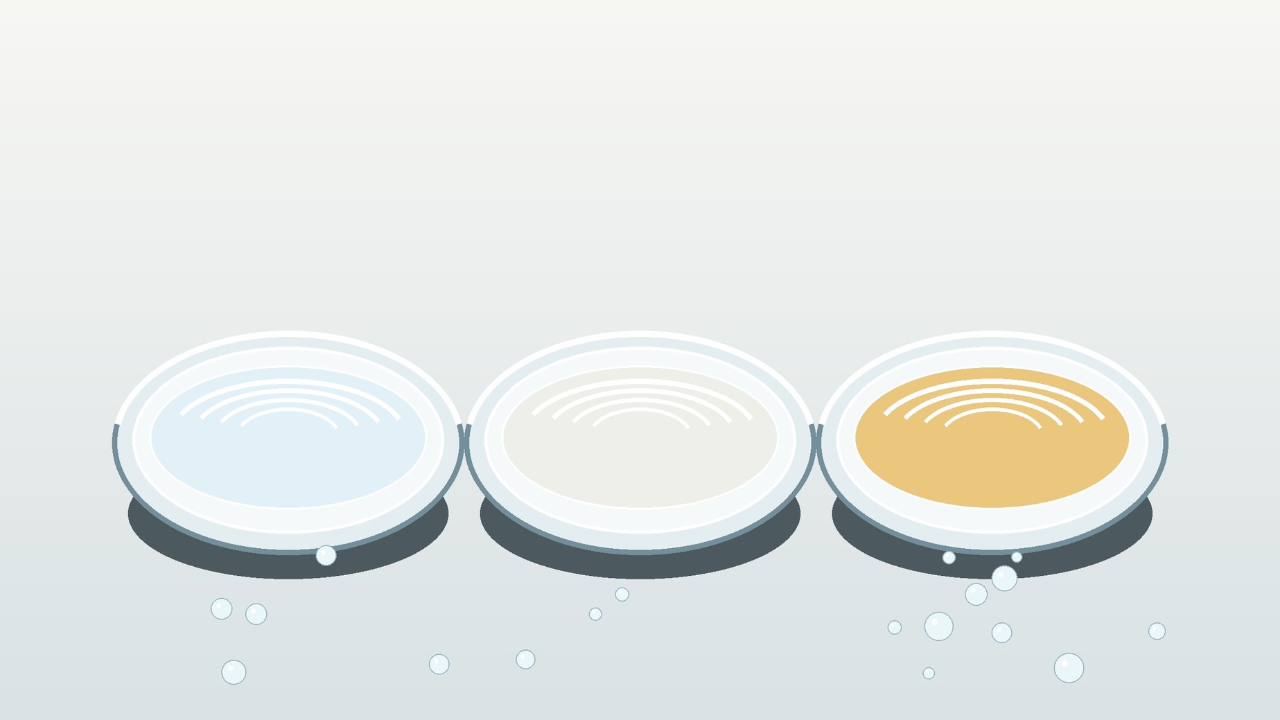Three unlabelled glass dishes hold clear blue-tinted, milky translucent and pale amber liquid samples.