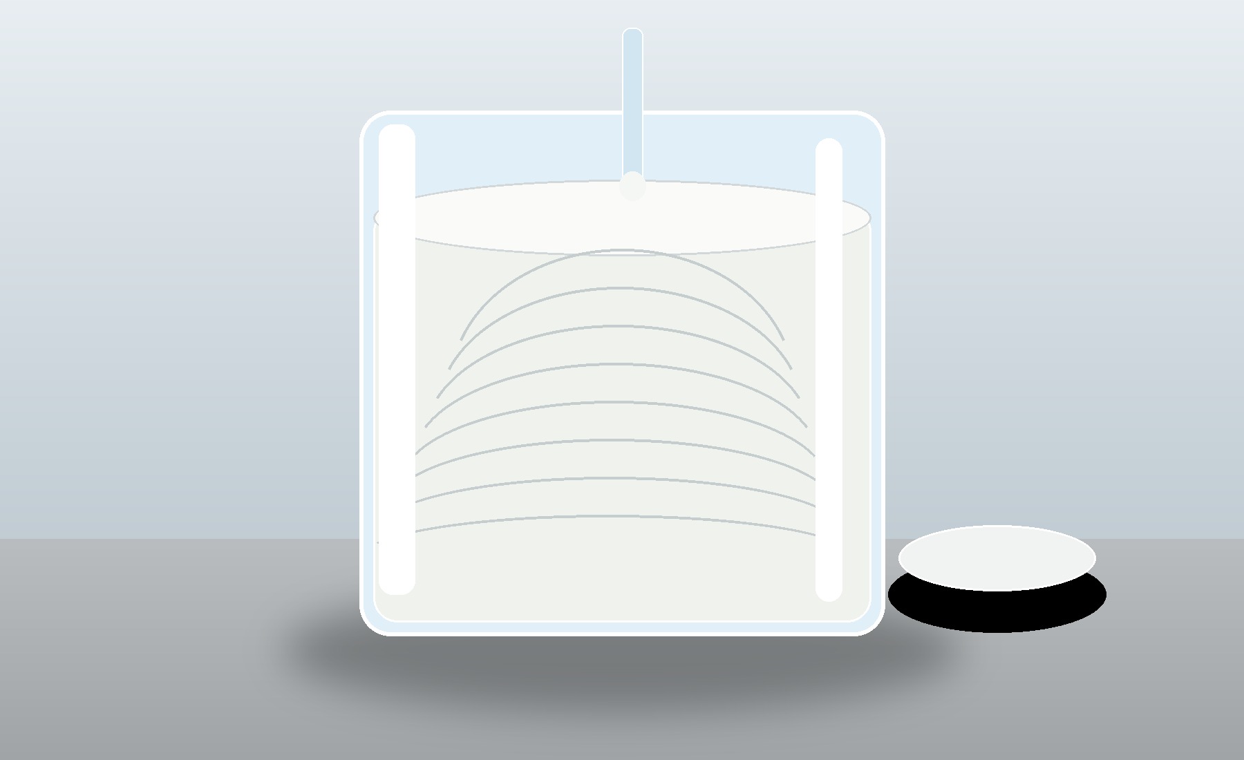 Unlabelled glass vessel containing a homogeneous pale silicone wax emulsion.