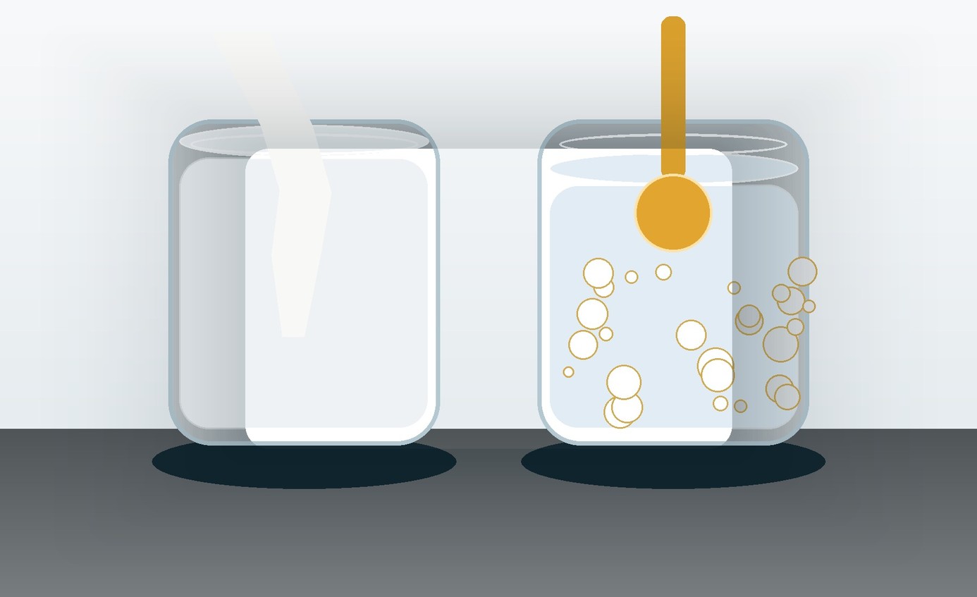 Two clear laboratory vessels show a milky silicone emulsion and a golden silicone-rich fluid without labels.