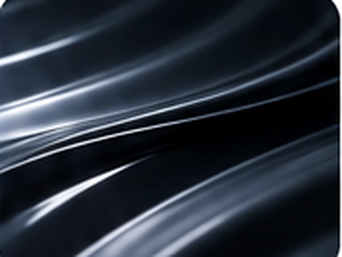 Smooth dark coated surface with flowing highlights representing low-friction surface control.